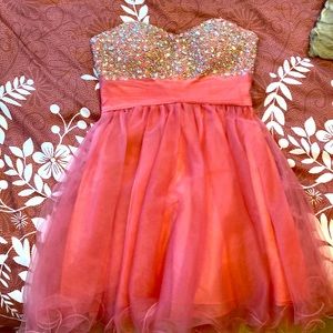Strapless, short sequence pink dress. Brand: Decode. Size: 2. Tag still on